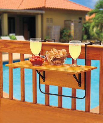 Folding Deck Table sets up in seconds and folds down flat when not in use. This attractive wood table comes with metal clamps and brackets that easily secure it to a porch or deck railing. Great for outdoor entertaining, the folding table is also ideal for decks or balconies with limited space.