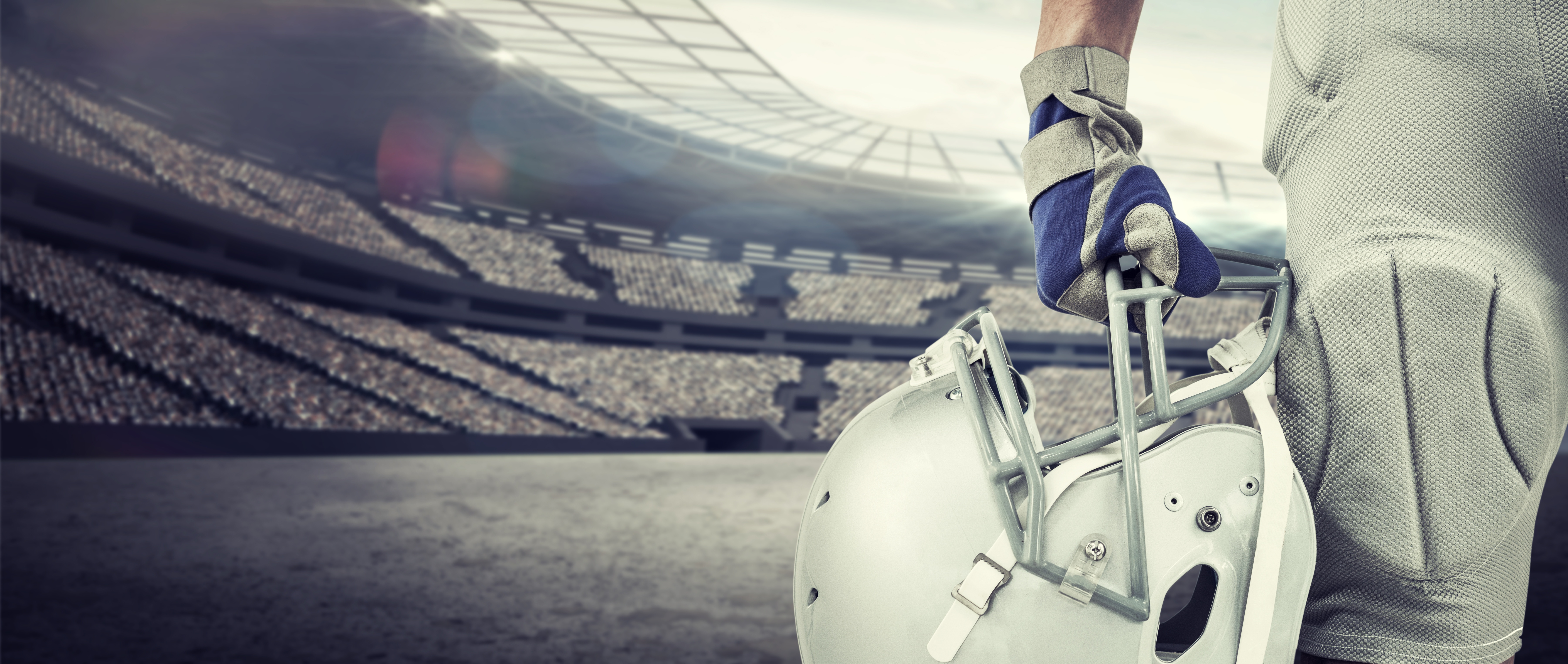 close-up-of-american-football-player-holding-helmet