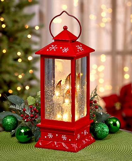 lighted-snowy-candle-lantern