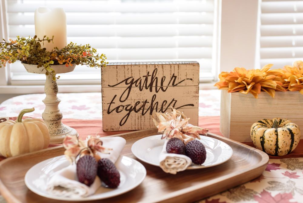 how to transition decor from halloween to thanksgiving - add thanksgiving decorations